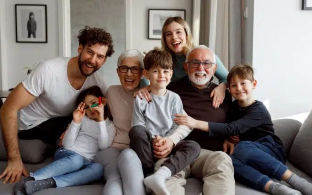 a family sitting on the couch